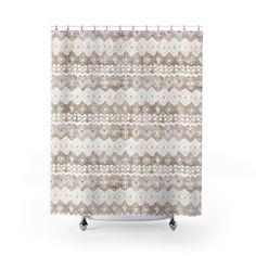 a beige and white shower curtain with an abstract pattern on the front, in shades of brown