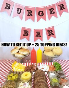 a table topped with lots of food and buns