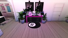 the room is decorated in pink and black with potted plants on the floor next to it