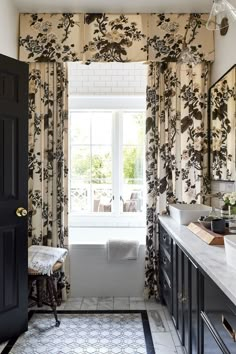 a bath room with a sink and a window