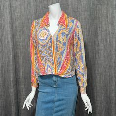 Beautiful Blouse By Rachel Zoe In A Vibrant Colorful Paisley All-Over Print, Hues Of Pink, Periwinkle, Blue, Yellow And Orange. Slight Textured Lightweight But Not Sheer Rayon Fabric. Long Sleeve With Button Cuffs. Note: Cuff Buttons Are Constructed From Shell And One Seems To Have Some Pink Chipped Off. Not Very Noticeable But Wanted To Disclose. Please See Last Photo For Detail. Bottom Back Of Blouse Has Elastic For Stretch. So It Looks Structured In Back Blousey In Front. Fold Over Collar, Mo Orange Floral Top, Silk Shirt Blouses, Floral Babydoll Top, Collared Blouse, Front Tie Shirt, Dyed Linen, Cute Blouses, Boho Shirts, Periwinkle Blue