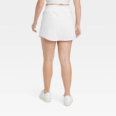 Why we're ALL IN: Woven mid-rise skort with built-in shorts in a regular-fit silhouette makes a cool choice for your active days. Moisture-wicking, quick-dry lightweight fabric helps you stay cool, while a drawcord elastic waistband provides a snug fit. Side pocket provides hands-free convenience and the UPF 50+ rating offers sun protection. All in Motion™: Made for every move, priced for every day. Casual Tennis Skirt With Built-in Shorts, Casual Tennis Activewear With Built-in Shorts, Cotton Tennis Skirt With Built-in Shorts, Casual Short Tennis Skirt With Built-in Shorts, Sporty Short Skort For Spring Workout, Spring Short Skort For Workout, Spring Athletic Shorts With Moisture-wicking Mid-thigh Length, Spring Athletic Shorts With Moisture-wicking, Mid-thigh Length, Sporty Tennis Skirt With Built-in Shorts