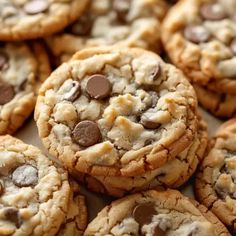 chocolate chip cookies are piled on top of each other