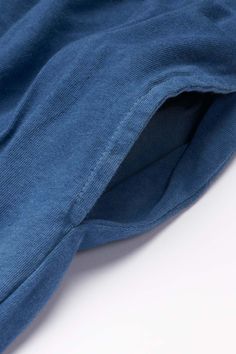 Dyed with indigo plants. Scroll down to learn more about our Indigo Collection. Made with our 100% organic cotton jersey fabric featuring 2 large pockets and cotton drawcord. Athletic shorts are constructed with a stretch waistband to ensure they stay comfortably in place. 5.4 oz jersey. Super soft, breathable and naturally flexible. 6” inseam. Pre-shrunk during the dyeing process. Style #AS111IN Fabric: 100% organic cotton USA grown Origins: Organic cotton grown in the USA, yarn spun and knit i