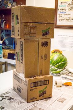 three boxes stacked on top of each other in the middle of a kitchen countertop