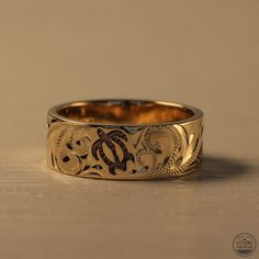 ring from Hawaii Unique Carved Yellow Gold Ring, Traditional Engraved Yellow Gold Ring, Yellow Gold Symbolic Carved Jewelry, Carved Symbolic Yellow Gold Jewelry, Symbolic Etched Jewelry For Promise, Unique Yellow Gold Engraved Ring, Traditional Yellow Gold Engraved Ring, Traditional Carved Yellow Gold Rings, Symbolic Etched Yellow Gold Rings