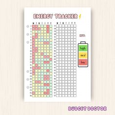 a printable energy tracker is shown on a table