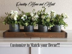 four vases with flowers in them sitting on a mantle next to the words, customize to match your decor