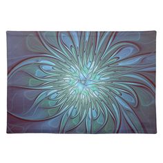 an abstract blue and green flower design placemats