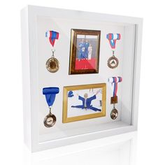 a shadow box with some medals on it