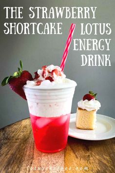 the strawberry shortcake is served in a cup with whipped cream and strawberries