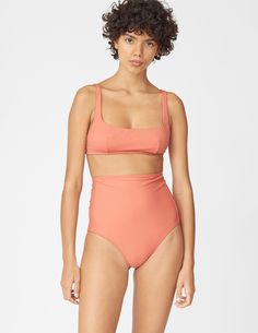 Back view of woman wearing a pink high-waisted bikini bottom and matching bikini top Public Pool, Ethical Swimwear, Modern Bikinis, Conscious Living, Fashion Guide, Ethical Brands, Swimwear Brands, Italian Fabric, Social Justice