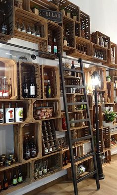 the shelves are filled with bottles and other items on display in this store's interior