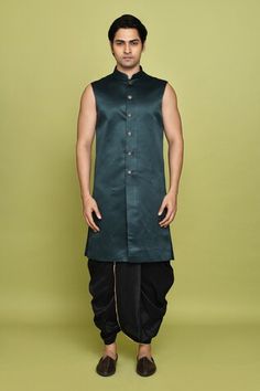 Green sherwani featuring feather pattern all over. Paired with a solid sleeveless inner kurta and a black dhoti. - Aza Fashions Fitted Traditional Wear With Naqshi For Navratri, Ceremonial Festive Sherwani With Tilla Details, Festive Ceremonial Sherwani With Tilla Details, Festive Ceremonial Sherwani With Tilla, Festive Green Traditional Drape Sherwani, Traditional Drape Kurta With Tilla For Eid, Festive Kurta With Tilla And Traditional Drape, Traditional Green Semi-stitched Sherwani, Green Semi-stitched Sherwani With Traditional Drape