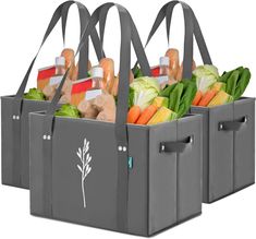 three grocery bags filled with vegetables and meat in each tote, one is gray