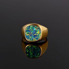 Gold & Green Opal Signet Ring - Also available in Royal Blue Lapis Lazuli & Black Onyx ✔️Weighty and Durable stainless steel Made using Gemstones - Natural Onyx & Lapis Lazuli - Opal is Lab created ✔️UNIQUE Design, larger style. Great for men! Different colour can be seen in different lighting. A Quality unique piece. ✔️Multiple Sizes for Selection Ring sizes: 5-12 - pinky sizes available. Please check the ring size chart attached. ✔️Quality Craftsmanship Combining quality finish with Quality. 1