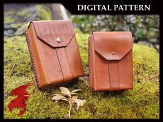 two brown leather cases sitting on top of a moss covered ground with the words digital pattern