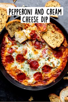 pepperoni and cream cheese dip in a skillet with crackers on the side