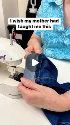 a woman using a sewing machine to sew something on her jeans with the caption, i wish my mother had taught me this