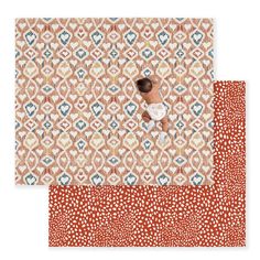 two pieces of patterned paper, one with an image of a woman in the middle