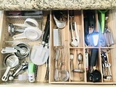 a drawer filled with lots of kitchen utensils