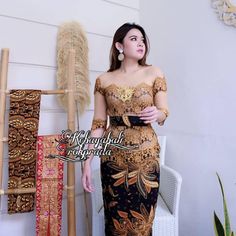 Kebaya dress | Complete set | for weddings or formal event | Brocade kebaya and batik skirt | glamorous kebaya with luxurious gold color Ori brocade brocade material (color gold combi black) Available in luxurious yellow gold color Cotton batik print skirt material Complete set (Kebaya, Skirt and belt (brooch and longtorso/inner layer of kebaya are sold sparated) Kebaya size (chest circumference): S 84cm M 88cm L 92cm XL 96cm 2XL 102cm 3XL 106cm Skirt size (hip circumference) S 85cm M 90cm L 95c Traditional Gold Evening Sets, Traditional Brocade Evening Sets, Gold Brocade Party Sets, Kebaya Wedding, Batik Skirt, Kebaya Brokat, Kebaya Dress, Batik Dress, Batik Prints