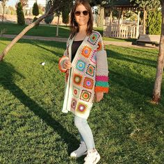 Discover the perfect blend of boho chic and cozy comfort with our handmade crochet granny square cardigan. This beautiful piece features a beige base decorated with vibrant, colorful motifs. Perfect for layering on cool summer evenings or as a statement piece in the colder months. Made from our cotton yarn, this cardigan is both soft and durable. Each cardigan is meticulously crafted, ensuring a unique and one-of-a-kind piece just for you. Perfect for day trips, work, beach days or festival wear. Shop for vintage gifts for your loved ones. *Made from super soft, hypoallergenic eco-friendly yarn just for you. *100% Handmade Rainbow Granny Square Pattern Each motif is unique and knitted specifically for you. The cardigan will be ready for you in 7-10 days. If you have any questions, please f Granny Square Vintage, Bohemian Cardigan, Crochet Granny Square Cardigan, Granny Square Cardigan, Square Cardigan, Yarn Gifts, Cardigan Crochet, Cardigan Beige, Crochet Granny Square