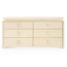 a white dresser with four drawers and two doors