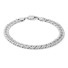 From the Made in Italy Collection, this 120 gauge Cuban curb chain bracelet set in sterling silver measures 8.5 inches in length and secures with a lobster claw clasp. Classic Sterling Silver Curb Chain Bracelet For Everyday, Everyday Silver Curb Chain Bracelets, Classic White Gold Cuban Link Bracelet With Curb Chain, Classic Silver Chain Charm Bracelet, Elegant Sterling Silver Bracelet With Cuban Link Curb Chain, Silver Cuban Link Jubilee Bracelet For Everyday, Classic Metal Curb Chain Bracelets, Modern Sterling Silver Curb Chain Bracelet, Classic White Gold Charm Bracelet With Silver Chain