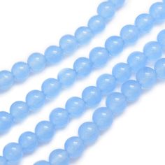 three strands of light blue glass beads