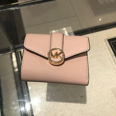 Find ideas๏ฟฝand inspiration for Michael Kors Women's Wallet Carmen Medium Flap bifold in Powder Blush, Womens Accessories Classic Pink Compact Wallet, Classic Compact Pink Wallet, Michael Kors Bifold Wallet With Card Slots, Michael Kors Luxury Bifold Wallet, Elegant Pink Michael Kors Wallet, Powder Blush, Michael Kors Wallet, Signature Design, Wallets For Women