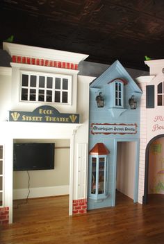 there is a doll house made out of plastic