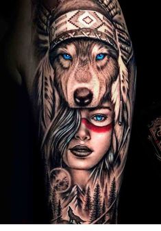 a woman with blue eyes and a wolf tattoo on her arm