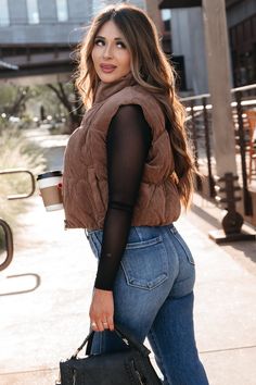 Fit Details: Jessica is 5’3, 32DD, size 3, and wearing a size small. *Fit is true to size. Note from the team: Rachel is 5’7, 155 lbs, 34B, size 7 in denim and wearing a size medium. Stylish Corduroy Puffer Sleeveless Vest Cropped Zip-up Vest Open front and two side pockets Approx. total length: 20 3/8" Material: 90% Polyester, 10% Nylon Care: Machine Wash Cold, Do Not Tumble Dry, Do Not Dry Clean Puffer Vest Casual Outfit, Cropped Puffer Vest Outfit, Colorado Vibes, Jumpsuit With Jacket, Short Dresses Party, Corduroy Puffer, Cropped Zip Up, Perfect Closet, Weather Wear