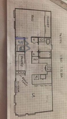 a drawing of a floor plan for a kitchen and living room in an apartment building