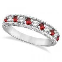 a white gold ring with red and clear stones