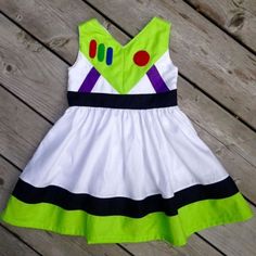 Dress Up Aprons, Buzz Lightyear Costume, Disney Baby Clothes, Toy Story Buzz Lightyear, Toy Story Buzz, Sister Outfits, Toy Story Birthday, Couture Mode, Frocks For Girls