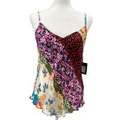 Cliche Silky Flowy Floral Spaghetti Strap Top With Adjustable Straps - M Excellent Condition -- Nwt - Silky Smooth Cami Featuring Asymmetrical Bands Of Floral Print - Adjustable Spaghetti Straps - V-Neck - Sleeveless - Pullover Style - Polyester - Handwash Length: 25-27" (Adjustable Straps) Pit To Pit: 19" Model Shown Is 5’10” (177cm) Wearing Us Size Small - Condition: All Items Are In Excellent Condition Unless Otherwise Stated And Shipped From A Non-Smoking, Pet-Friendly Home. (One Dog. No Cat Fitted Multicolor Spaghetti Strap Tank Top, Trendy Multicolor Spaghetti Strap Tops, Fitted Multicolor Camisole, Fitted Multicolor Casual Camisole, Fitted Multicolor Camisole For Beach, Trendy Multicolor Sleeveless Camisole, Multicolor Spaghetti Strap Camisole For Spring, Spring Multicolor Spaghetti Strap Camisole, Chic Multicolor Spaghetti Strap Camisole