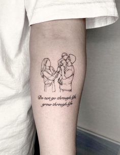 a couple holding each other with the words on their arm