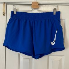 Nwt Nike Blue Running Shorts, Size L Blue Nike Athletic Shorts, Nike Blue Athletic Shorts With Built-in Shorts, Nike Blue Athletic Shorts, Nike Blue Athletic Shorts For Spring, Nike Blue Bottoms With Elastic Waistband, Nike Stretch Blue Bottoms, Nike Blue Workout Bottoms, Nike Blue Shorts For Beach, Nike Workout Bottoms In Blue