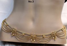 * Beautifully designed gold color belly chain. * can be used with belly dance costumes and saris. * D.no.1- Adjustable from32 to 40 inches Waist. * D.no.2- Adjustable from 32 to 40 inches Waist. * D.no.3- Adjustable from 32 to 40 inches Waist. * D.no.4- Adjustable from 24 to 36 inches Waist. Indian Belly Piercing, Golden Waist Chain, Gold Pearl Chain Waist Chain For Party, Gold Waist Chain With Pearl Details For Party, Elegant Gold Waist Chain For Festive Occasions, Gold Pearl Chain Body Jewelry For Wedding, Elegant Gold Waist Chain For Festivals, Elegant Festive Waist Chain, Festive Elegant Gold Waist Chain