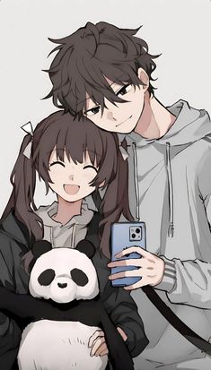 two people are holding a panda bear and taking a selfie with a cell phone