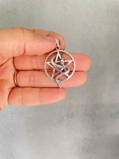 Materials: Sterling Silver 925Sterling Silver Pentagram Pendant Pentacle Pendant  Wiccan jewelry Pagan Jewelry Pentagram necklace Gothic pentagram Wicca jewelry Pentagram Pendant SnakeThe pendant comes without chain.If you need a chain, you can purchase it separately by selecting the size.We have two kinds of chains:Snake chain 16 "18" 20 " 24"Chain in the form of rings 18 "www.etsy.com/shop/HandmadeNordicGifts?section_id=32386755 Sterling Silver Star Of David For Jewelry Making, Adjustable Symbolic Star Jewelry, Symbolic Star-shaped Adjustable Jewelry, Adjustable Star-shaped Symbolic Jewelry, Handmade Sterling Silver Star Of David Jewelry, Gothic Sterling Silver Jewelry With Lobster Clasp, Star-shaped Metal Jewelry With Lobster Clasp, Star Shaped Metal Jewelry With Lobster Clasp, Sterling Silver Star Of David Charms Jewelry