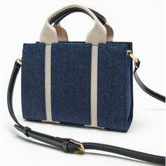 Zara Nwt Denim Fabric Mini City Bag Denim Blue Fabric Mini City Bag. Handles And Removable Crossbody Shoulder Strap. Zip Closure. Height X Length X Width: 9.3” X 11.3” X 5.1” Outer Shell Fabric Main Fabric: 100% Cotton Strap: 80% Polyester 20% Polyurethane Shoulder Strap: 100% Polyurethane Lining: 100% Cotton Imported Bundle And Save Mini City, Denim Shoulder Bags, Zara Bags, City Bag, Denim Bag, Shopper Bag, Denim Fabric, Denim Blue, Blue Fabric