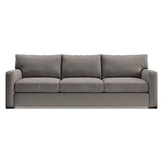 a gray couch sitting on top of a white floor