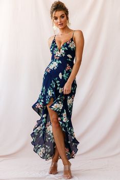 Look like a princess in our stunning Imelda dress! Perfect for cocktails with your girls at a classy rooftop bar or an extravagant daytime event. Featuring a plunging V-neckline, high-low hem, adjustable cami straps and the most gorgeous, soft, floral print fabric. Team it with gold hoop earrings, tousled locks and a clutch for an elegant look we are loving. Hot Party Dresses, Navy Print Dress, Selfie Leslie, Floral High Low Dress, Floral Print Fabric, Soft Floral, Vestidos Vintage, Rooftop Bar, Hot Dress