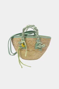 This product is final sale. Straw basket bag that features two iconic handles, brand signature embossed on the handles, leather shoulder strap and an internal storage bag with drawstring closure. All accessories are considered final sale Composition: 80% Straw, 20% Cotton Luxury Leather Basket Bucket Bag, Luxury Summer Bag With Rolled Handles, Luxury Green Top Handle Bucket Bag, Spring Bucket Shoulder Bag With Handles, Straw Bag With Rolled Handles For Shopping, Green Bucket Bag With Adjustable Strap And Top Handle, Spring Top Handle Bucket Bag For Daily Use, Everyday Leather Basket Bag, Leather Basket Shoulder Bag For Daily Use