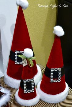 two santa hats sitting next to each other