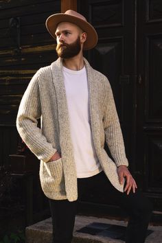 "The regular new wool men's cardigan fit falls a little and longer, producing a cool oversized look. Warm and super cozy cardigan with two front pockets for chilly winter's days. Timeless classic and perfectly comfortable 100% pure new wool sweater for your beloved husband, boyfriend, dad or son. Inspired by timeless Scandinavian style. Model in the photo is wearing size L. Model's height is 180 cm / 5.9 ft. *SIZE XS USA-CAN 30-32 EU 40-42 Garment's width 17.5-18 inch / 44-46 cm Garment's length Woolen Clothes, Woolen Sweater, Woolen Sweaters, Scandinavian Fashion, Men's Cardigan, Cozy Cardigan, Mens Cardigan, Printed Cardigan, Merino Wool Sweater