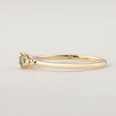 This ring setting fits gemstones up to 0.50ct. Band width: ranges from 1.3mm to 1.5mm depending on the center-stone size Accent stones: Natural diamonds Elevated four prongs flower setting Made of recycled solid 14k gold, 18k gold, or platinum 950 Packaged in a recyclable kraft ring box. Velvet ring box is available for upgrade. Flower Setting, Velvet Ring Box, Ring Setting, Three Stone, Ring Box, Diamond Bands, Ring Sets, Natural Diamonds, Platinum